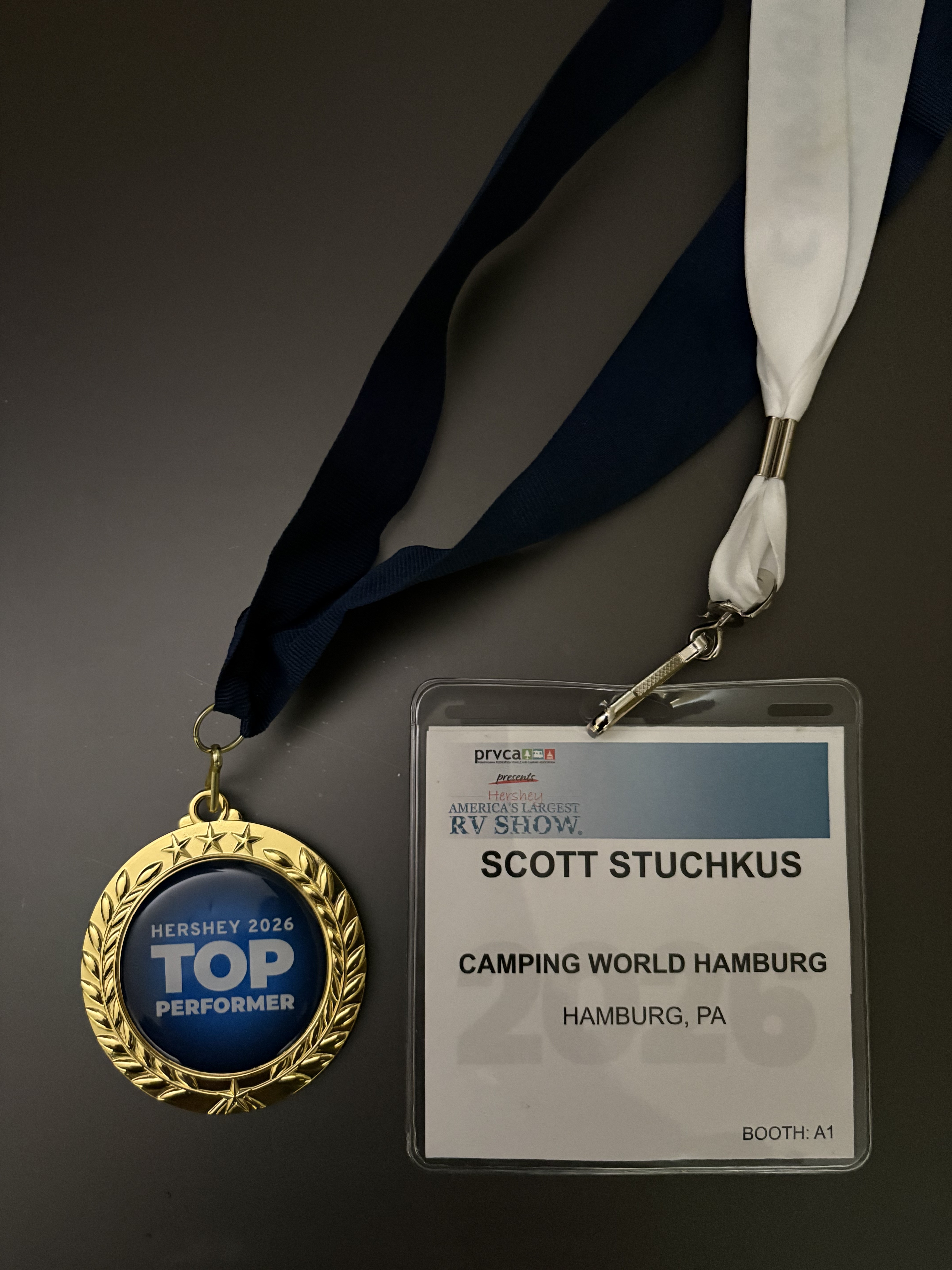 Hershey 2026 Top Performer medal and America's Largest RV Show badge